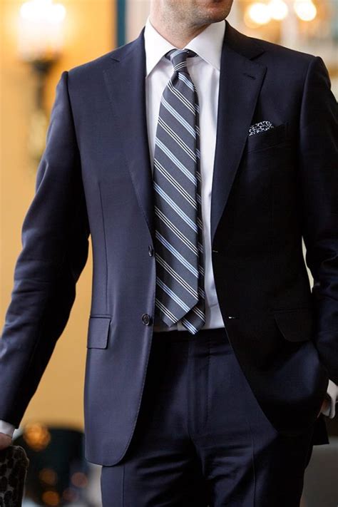 navy blue suit with tie